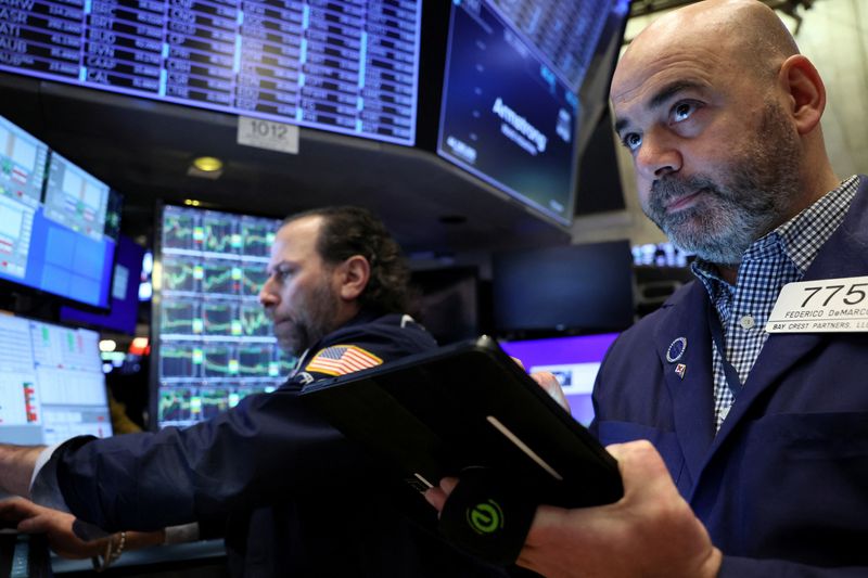 Wall St set for lower open after mixed earnings; jobs data in focus