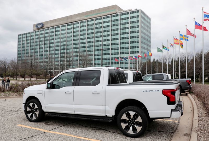 &copy; Reuters. FILE PHOTO: A model of the all-new Ford F-150 Lightning electric pickup is parked in front of the Ford Motor Company World Headquarters in Dearborn, Michigan, U.S. April 26, 2022. REUTERS/Rebecca Cook/File Photo
