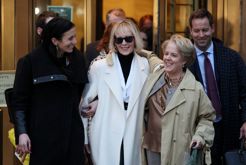 &copy; Reuters. FILE PHOTO: E. Jean Carroll and her attorneys Shawn Crowley and Roberta Kaplan walk outside the Manhattan Federal Court, after the verdict in the second civil trial after she accused former U.S. President Donald Trump of raping her decades ago, in New Yor