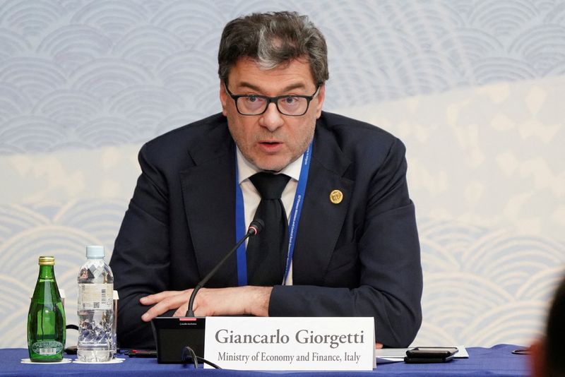 &copy; Reuters. FILE PHOTO: Italy's Minister of Economy and Finance Giancarlo Giorgetti delivers a speech at the G7 High-Level Corporate Governance Roundtable in Niigata on May 11, 2023.     KAZUHIRO NOGI/Pool via REUTERS/File Photo