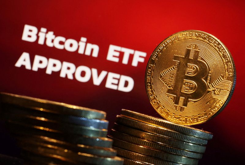 &copy; Reuters. FILE PHOTO: Representation of Bitcoin cryptocurrency and "Bitcoin ETF Approved" words are seen in this illustration taken January 11, 2024. REUTERS/Dado Ruvic/Illustration/File Photo