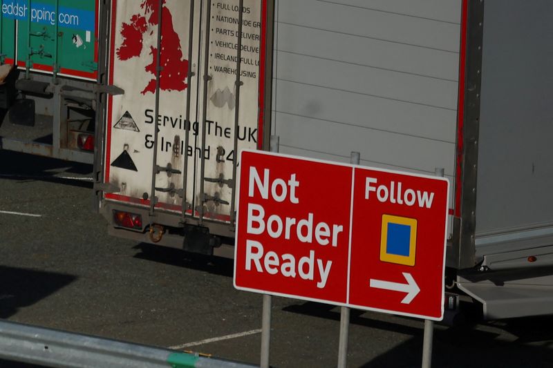 &copy; Reuters. Heavy goods trailers are seen near a 'Not Border Ready' sign in a lorry park at the Port of Holyhead in Holyhead, Britain, January 30, 2024 REUTERS/Phil Noble