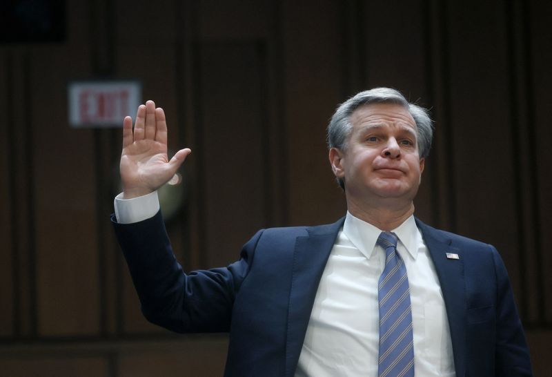 &copy; Reuters. FBI Director Christopher Wray is sworn in before testifying at a Senate Judiciary Committee oversight hearing of the Federal Bureau of Investigation on Capitol Hill in Washington, U.S., December 5, 2023. REUTERS/Leah Millis/File Photo