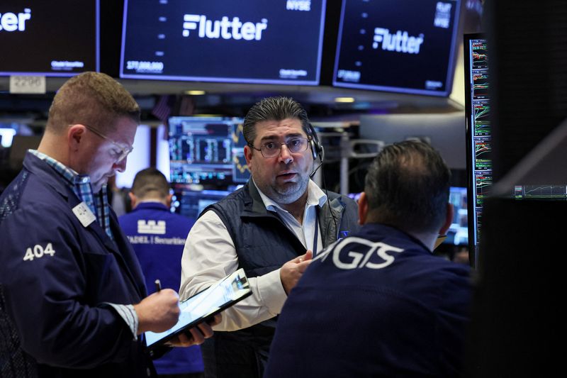 Wall St ends lower after Fed holds rates steady, rules out March rate cut