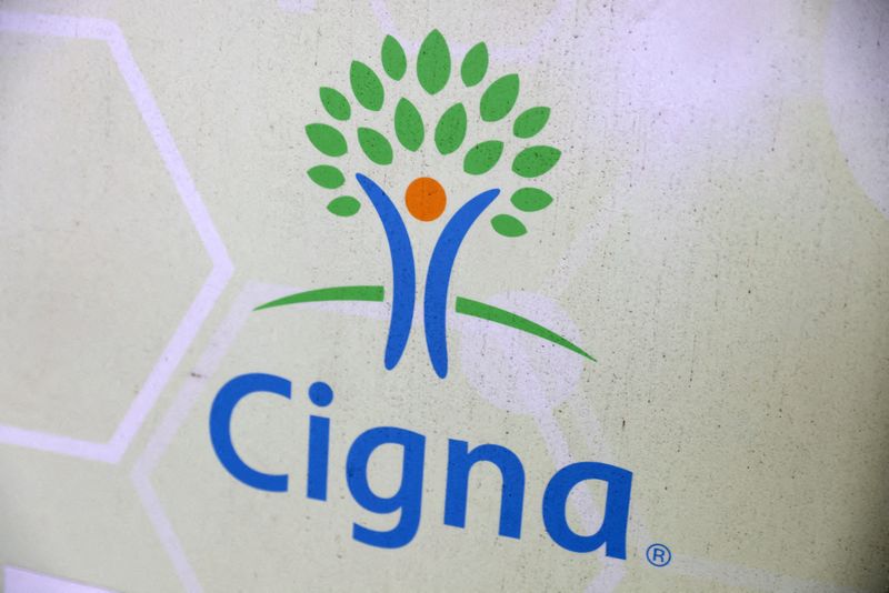 &copy; Reuters. FILE PHOTO: Signage for Cigna is pictured at a health facility in Queens, New York City, U.S., November 30, 2021. REUTERS/Andrew Kelly/File Photo