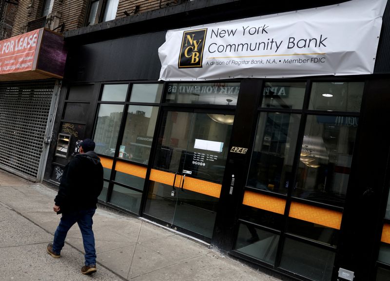 &copy; Reuters. FILE PHOTO: A man walks past a closed branch of the New York Community Bank in New York City, U.S., January 31, 2024. REUTERS/Mike Segar/File Photo