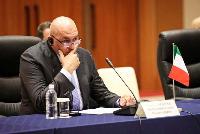 &copy; Reuters. FILE PHOTO: Italy’s Defense Minister Guido Crosetto listens during a trilateral meeting with British Defence Secretary Ben Wallace and Japan’s Defense Minister Yasukazu Hamada, in Tokyo, Japan March 16, 2023. Takashi Aoyama/Pool via REUTERS/File Photo