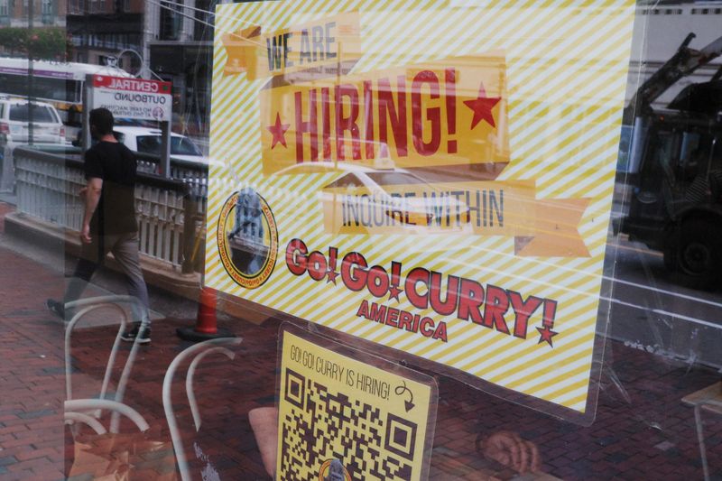 &copy; Reuters. FILE PHOTO: The Go! Go! Curry restaurant has a sign in the window reading "We Are Hiring" in Cambridge, Massachusetts, U.S., July 8, 2022.   REUTERS/Brian Snyder/File Photo