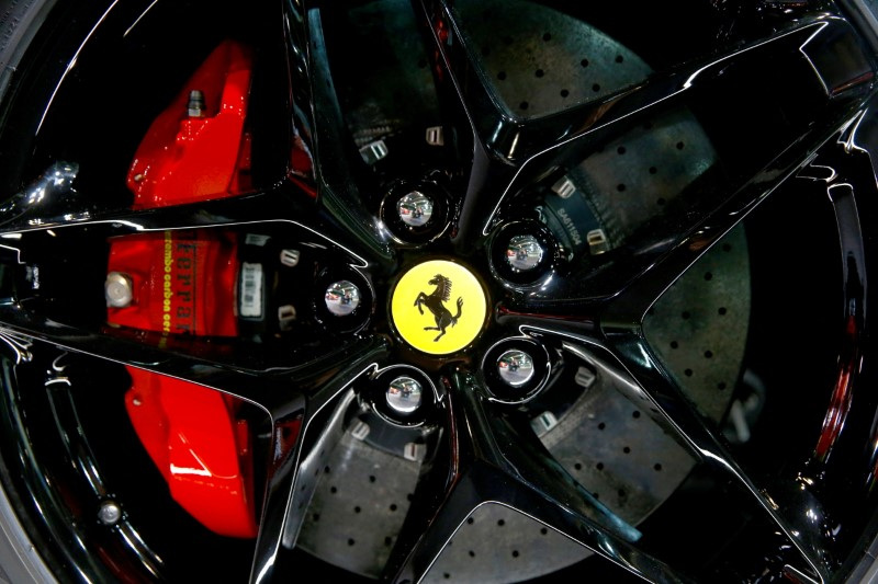 &copy; Reuters. FILE PHOTO: The company's logo is seen on a wheel hub of a Ferrari SF90 Stradale hybrid sports car during a media preview at the Auto Zurich Car Show in Zurich, Switzerland November 3, 2021. REUTERS/Arnd Wiegmann/File Photo