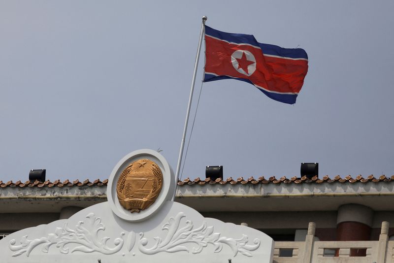 &copy; Reuters. FILE PHOTO: The North Korean flag flutters at the North Korea consular office in Dandong, Liaoning province, China April 20, 2021. REUTERS/Tingshu Wang/File Photo
