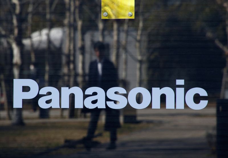 &copy; Reuters. A man is reflected on Panasonic Corp's logo at Panasonic Center in Tokyo, Japan, February 2, 2017.  REUTERS/Kim Kyung-Hoon/File Photo