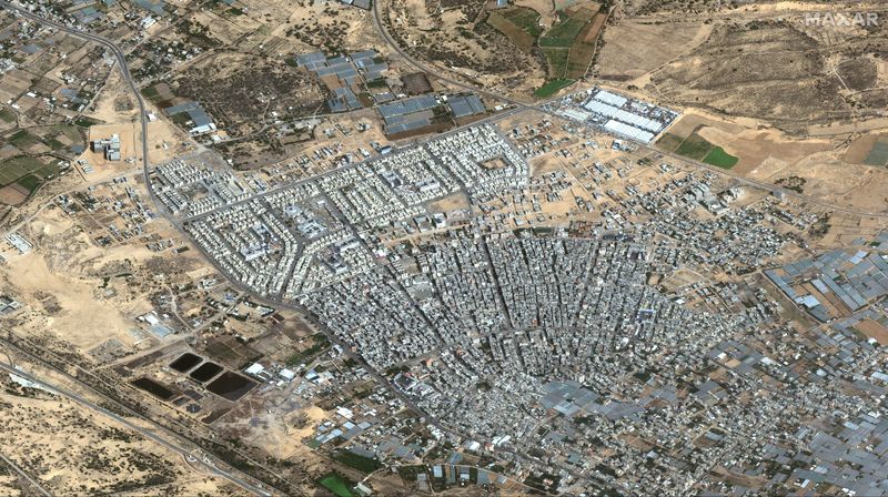 Israel pressures Gaza cities, health officials say 18 die in airstrikes