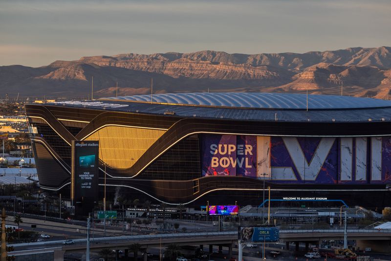 &copy; Reuters. FILE PHOTO: The rising sun illuminates the Allegiant Stadium, where Super Bowl LVIII will take place, in Las Vegas, Nevada, U.S., January 24, 2024. REUTERS/Carlos Barria/File Photo