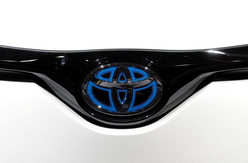 &copy; Reuters. FILE PHOTO: The Toyota RAV4 Hybrid logo is seen during the first press day of the Paris auto show, in Paris, France, October 2, 2018. REUTERS/Benoit Tessier/File Photo