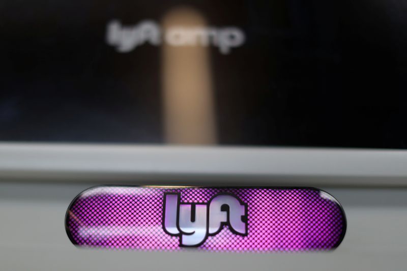 &copy; Reuters. A Lyft <LYFT.O> logo is seen in the Driver Hub in Los Angeles, California, U.S., March 20, 2019.  REUTERS/Lucy Nicholson/File Photo