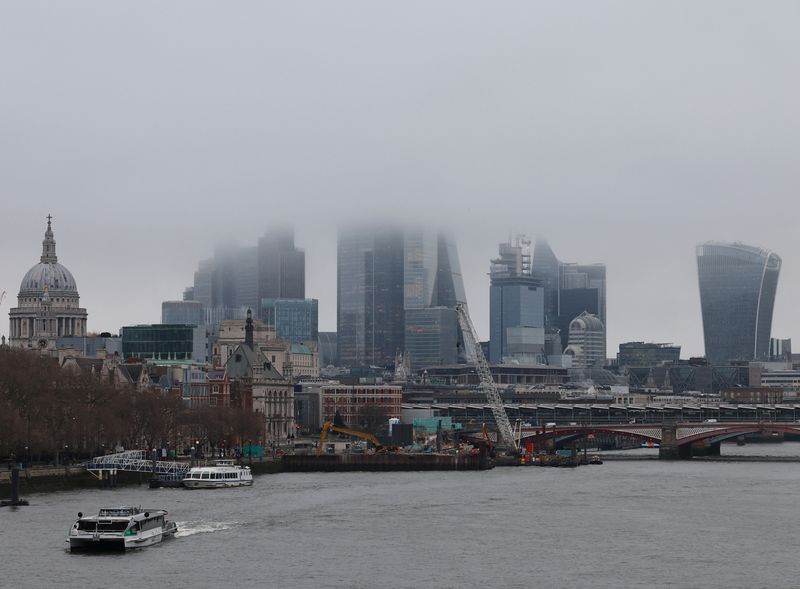 &copy; Reuters. Low cloud and mist shroud the top of skyscrapers in the City of London financial district, Britain, February 2, 2024. REUTERS/Toby Melville/File Photo