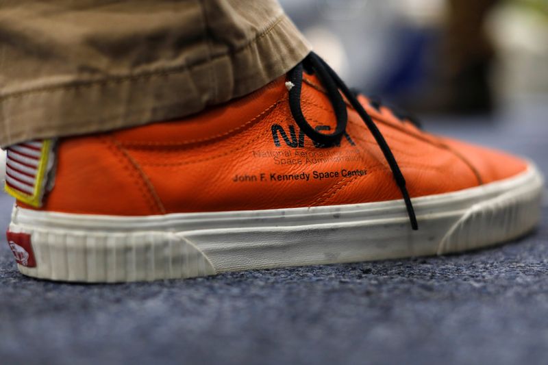 © Reuters. A pair of Vans NASA sneakers are worn by commercial crew astronaut Victor Glover as he trains inside a replica International Space Station at the the Johnson Space Center in Houston, Texas, U.S., May 22, 2019. Picture taken May 22, 2019.   REUTERS/Mike Blake/File Photo
