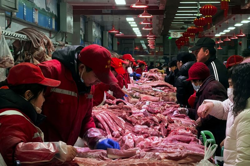 Beijing's butchers a glum bunch as Lunar New Year meat sales slow