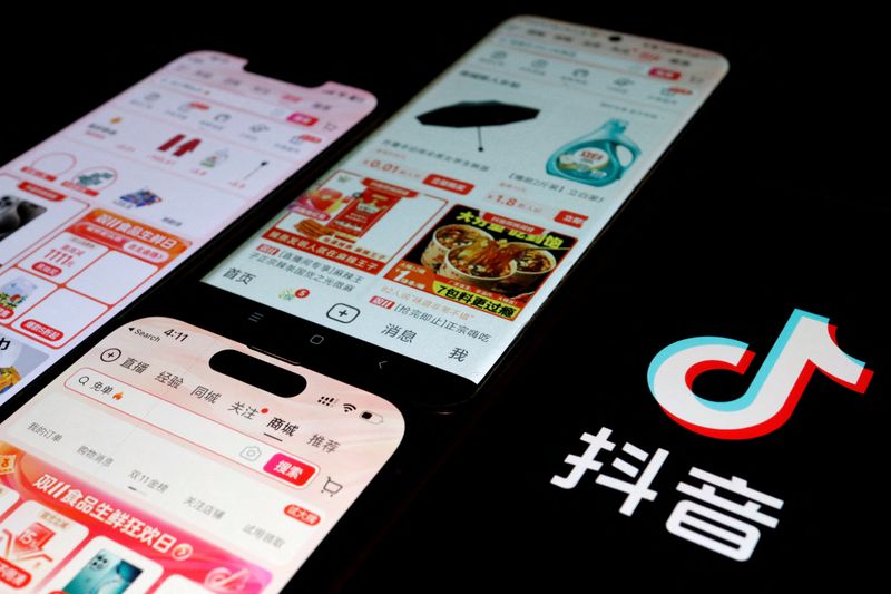 &copy; Reuters. FILE PHOTO: The logo of Douyin is displayed next to mobile phones displaying the e-commerce sites on the app, in this illustration picture taken October 25, 2023. REUTERS/Florence Lo/Illustration/File Photo