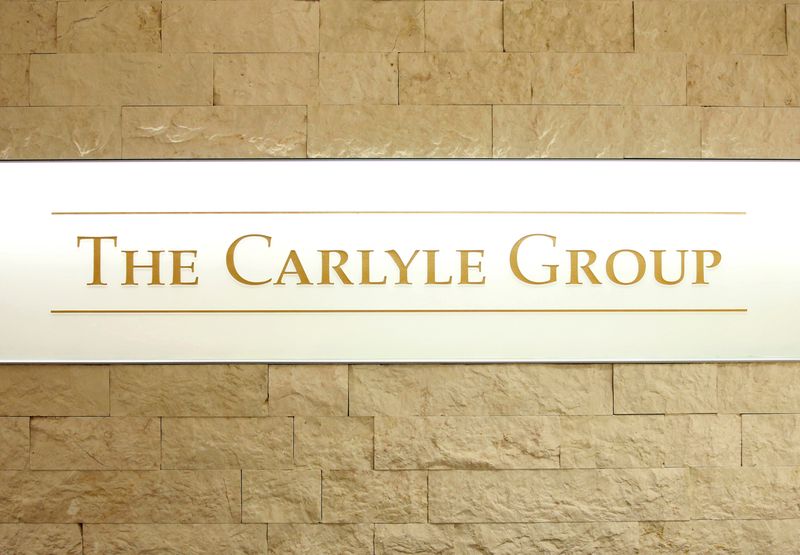 &copy; Reuters. The logo of the Carlyle Group is displayed at the company's office in Tokyo, Japan October 17, 2018. REUTERS/Issei Kato/File Photo