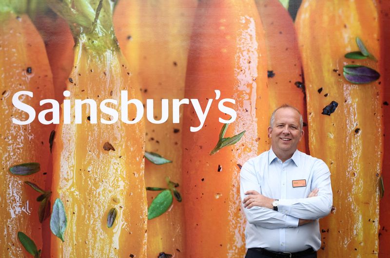 &copy; Reuters. FILE PHOTO: Chief Executive Officer of Sainsbury's Simon Roberts poses inside a Sainsbury’s supermarket in Richmond, west London, Britain, June 27, 2022. REUTERS/Henry Nicholls/File Photo