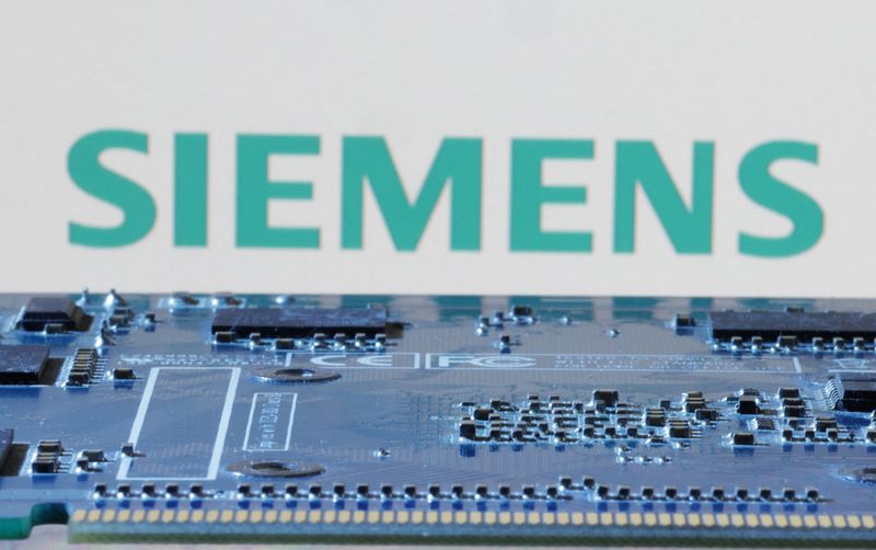 &copy; Reuters. FILE PHOTO: Siemens logo is seen near computer motherboard in this illustration taken January 8, 2024. REUTERS/Dado Ruvic/Illustration/File Photo