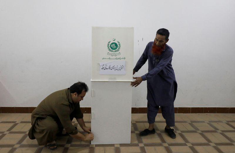 Pakistan ex-PMs and bitter rivals Sharif and Khan both claim poll win