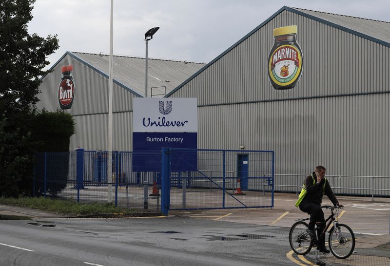 &copy; Reuters. A man cycles past Unilever's Marmite factory in Burton upon Trent, Britain, October 13, 2016.  REUTERS/Darren Staples/ File Photo
