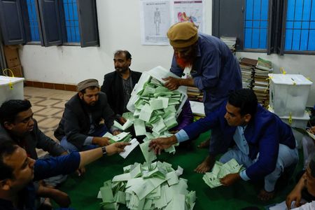 With over 100 seats counted, Imran Khan's supporters lead in Pakistan - media By Reuters