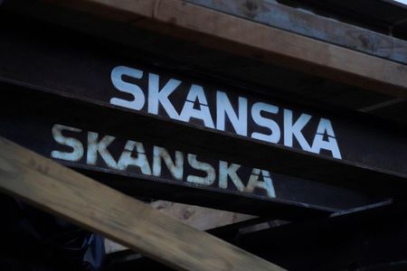 Swedish builder Skanska's profits tumble, but less than expected By Reuters
