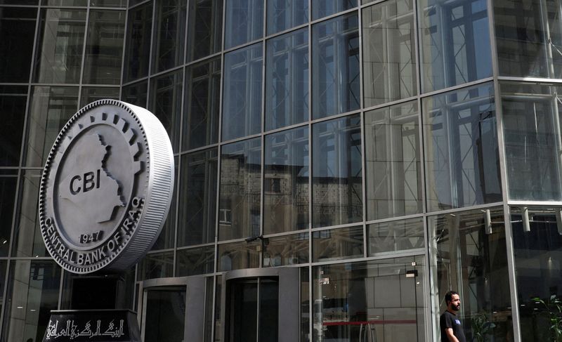 &copy; Reuters. FILE PHOTO: FILE PHOTO: An Iraqi man walks past the headquarters of the Central Bank of Iraq in Baghdad, Iraq August 15, 2023. REUTERS/Ahmed Saad/File Photo/File Photo