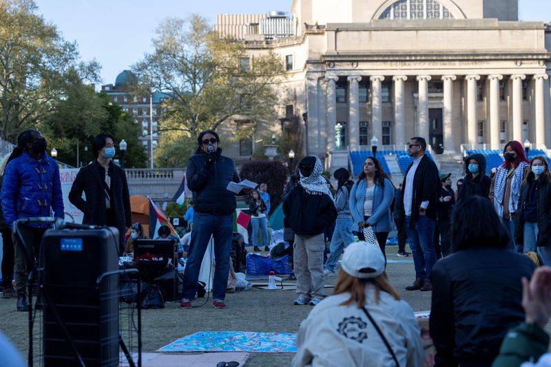 &copy; Reuters. Frank Guridy, a Columbia University history professor who teaches a course called "Columbia 1968" speaks to students in an educational session hosted at the protest encampment on campus, maintained by student protesters in support of Palestinians at Colum