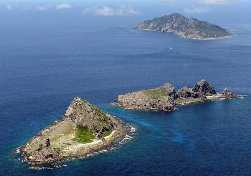 &copy; Reuters. FILE PHOTO: A group of disputed islands, Uotsuri island (top), Minamikojima (bottom) and Kitakojima, known as Senkaku in Japan and Diaoyu in China is seen in the East China Sea, in this photo taken by Kyodo September 2012. Mandatory credit. REUTERS/Kyodo/