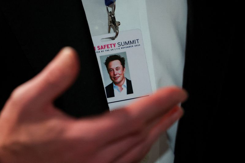 &copy; Reuters. FILE PHOTO: CEO of Tesla and X Elon Musk's summit ID is seen as he gestures at the AI Safety Summit in Bletchley Park, near Milton Keynes in Britain, November 1, 2023 REUTERS/Toby Melville/Pool/File Photo