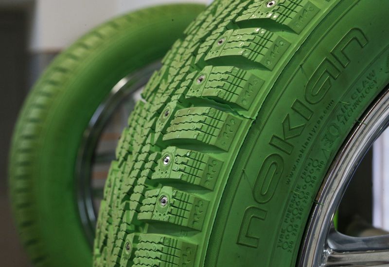 &copy; Reuters. Nokian tyres are stored at a tyre assembling centre and shop in Moscow, August 8, 2014. Finnish winter tyre maker Nokian Renkaat reported a bigger-than-expected fall in second-quarter operating profit due to plummeting sales in Russia. REUTERS/Maxim Sheme