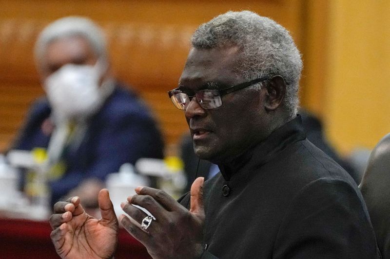 &copy; Reuters. FILE PHOTO: Visiting Solomon Islands Prime Minister Manasseh Sogavare speaks during a bilateral meeting with his Chinese counterpart Li Qiang at the Great Hall of the People in Beijing, Monday, July 10, 2023. Andy Wong/Pool via REUTERS/File Photo