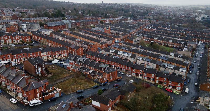 &copy; Reuters. FILE PHOTO: A general view of streets lined with terraced housing in Blackburn, Britain, January 17, 2022. Picture taken with a drone. REUTERS/Phil Noble/File Photo