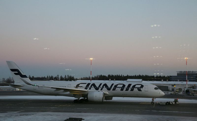 © Reuters. FILE PHOTO: A Finnair plane is seen on the tarmac at Helsinki-Vantaa airport, Vantaa, Finland, February 9, 2024. REUTERS/Tom Little/File Photo