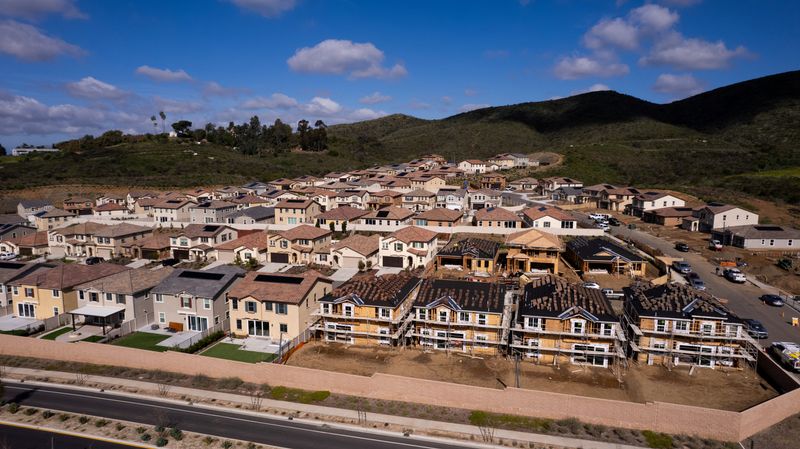 &copy; Reuters. FILE PHOTO: A drone view shows single-family homes at a new subdivision under construction in the rural hills of San Marcos, California, U.S., March 25, 2024.  REUTERS/Mike Blake/File Photo