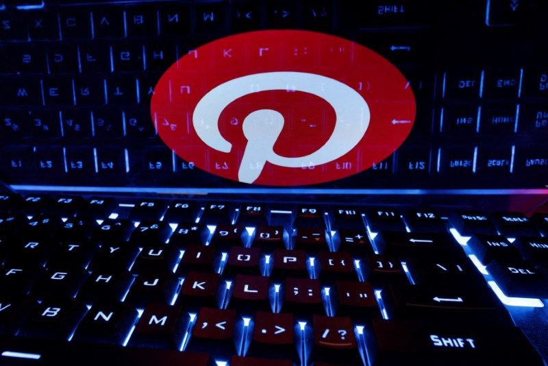 &copy; Reuters. FILE PHOTO: A keyboard is placed in front of a displayed Pinterest logo in this illustration taken February 21, 2023. REUTERS/Dado Ruvic/Illustration/File Photo