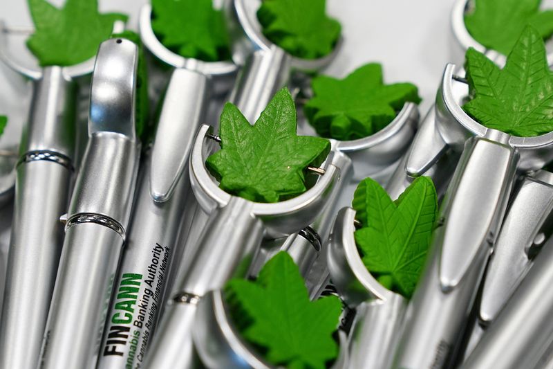 &copy; Reuters. FILE PHOTO: Pens featuring a marijuana leaf are pictured on a table at the Cannabis World Congress & Business Exposition (CWCBExpo) in the Manhattan borough of New York City, New York, U.S., November 5, 2021. REUTERS/Carlo Allegri/File Photo