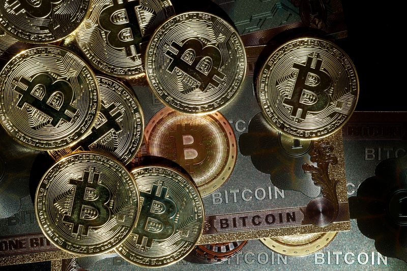 &copy; Reuters. FILE PHOTO: Representations of cryptocurrency Bitcoin are seen in this illustration picture taken in Paris, France, March 9, 2024. REUTERS/Benoit Tessier/Illustration/File Photo