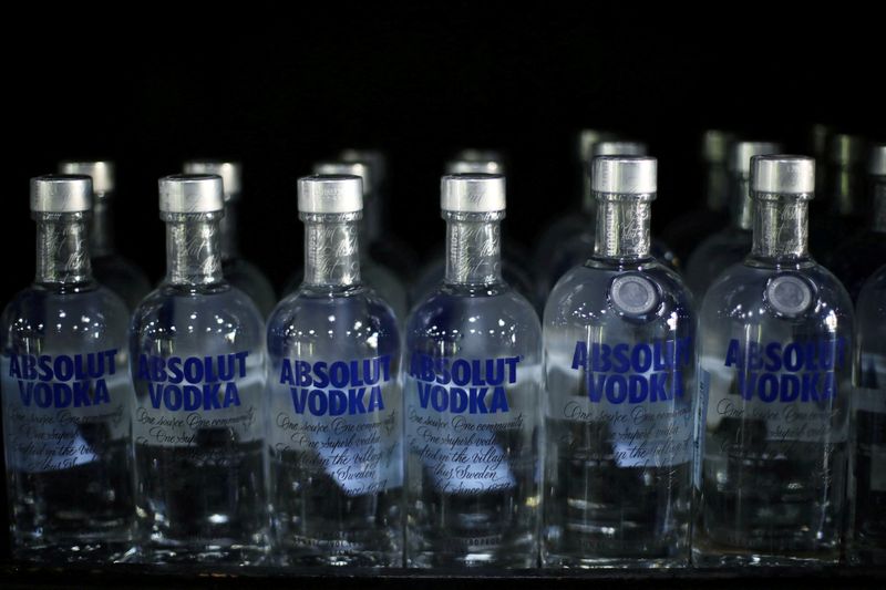 © Reuters. FILE PHOTO: Absolut vodka bottles are seen displayed, amid the outbreak of the coronavirus disease (COVID-19), at a liquor store in Amman, Jordan, October 21, 2020. REUTERS/Muhammad Hamed/File Photo