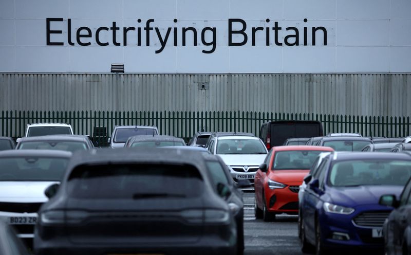 &copy; Reuters. FILE PHOTO: Signage saying ‘Electrifying Britain’ is seen on the outside of the Stellantis owned Vauxhall car factory in Ellesmere Port, Britain, September 20, 2023. REUTERS/Phil Noble/File Photo