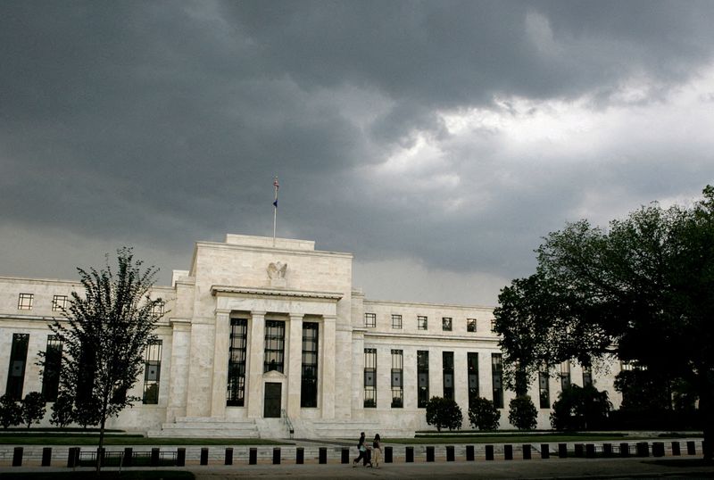 &copy; Reuters. FILE PHOTO: Storm clouds gather over the U.S. Federal Reserve Building before an evening thunderstorm in Washington June 9, 2006. REUTERS/Jim Bourg/File Photo