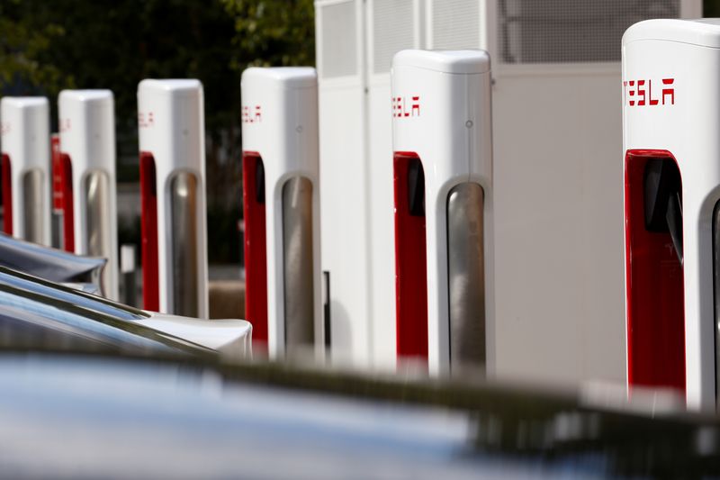 &copy; Reuters. Tesla cars are seen next to the V3 supercharger equipment during the presentation of the new charge system in the EUREF campus in Berlin, Germany September 10, 2020. REUTERS/Michele Tantussi/File Photo