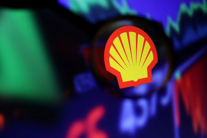 &copy; Reuters. FILE PHOTO: Shell logo and stock graph are seen through a magnifier displayed in this illustration taken September 4, 2022. REUTERS/Dado Ruvic/Illustration/File Photo