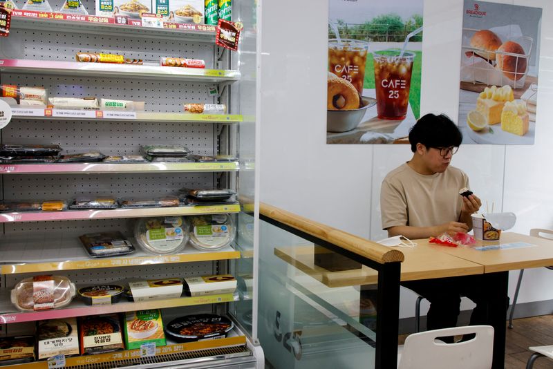 &copy; Reuters. An office worker eats his lunch at a convenience store in Seoul, South Korea, June 24, 2022. Picture taken June 24, 2022.  REUTERS/ Heo Ran/File Photo