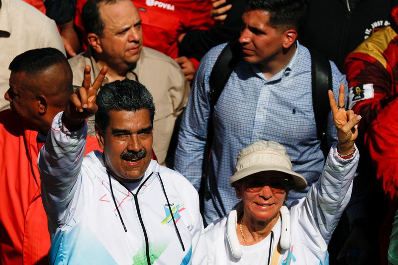 &copy; Reuters. Venezuela's President Nicolas Maduro and his wife Cilia Flores participate in a rally during May Day celebrations in Caracas, Venezuela May 1, 2024. REUTERS/Leonardo Fernandez Viloria