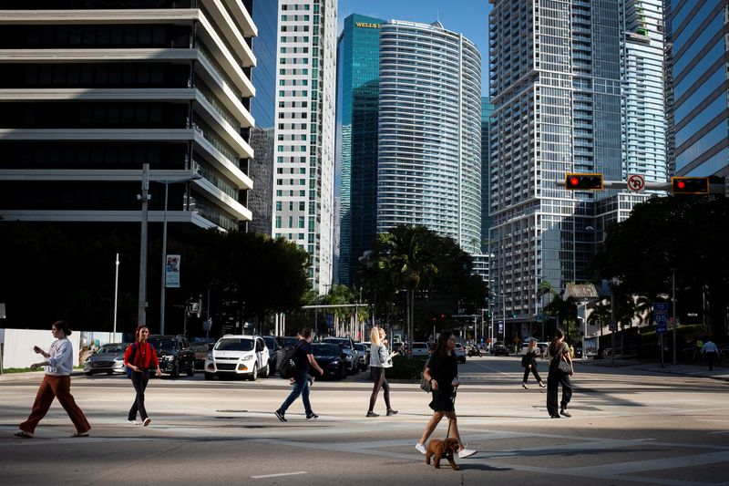 &copy; Reuters. File photo: People cross the intersection of SW 8th Steet and Brickell Ave. at the Brickell neighborhood, known as the financial district, in Miami, Florida, U.S., February 23, 2023. REUTERS/Marco Bello/File photo